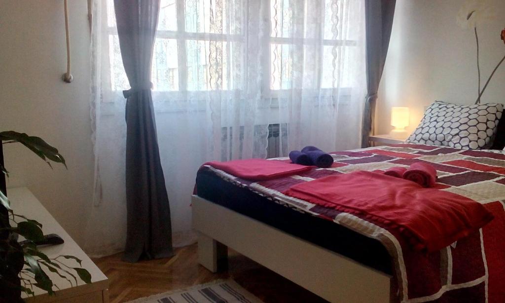 Posteľ alebo postele v izbe v ubytovaní Apartment Melon