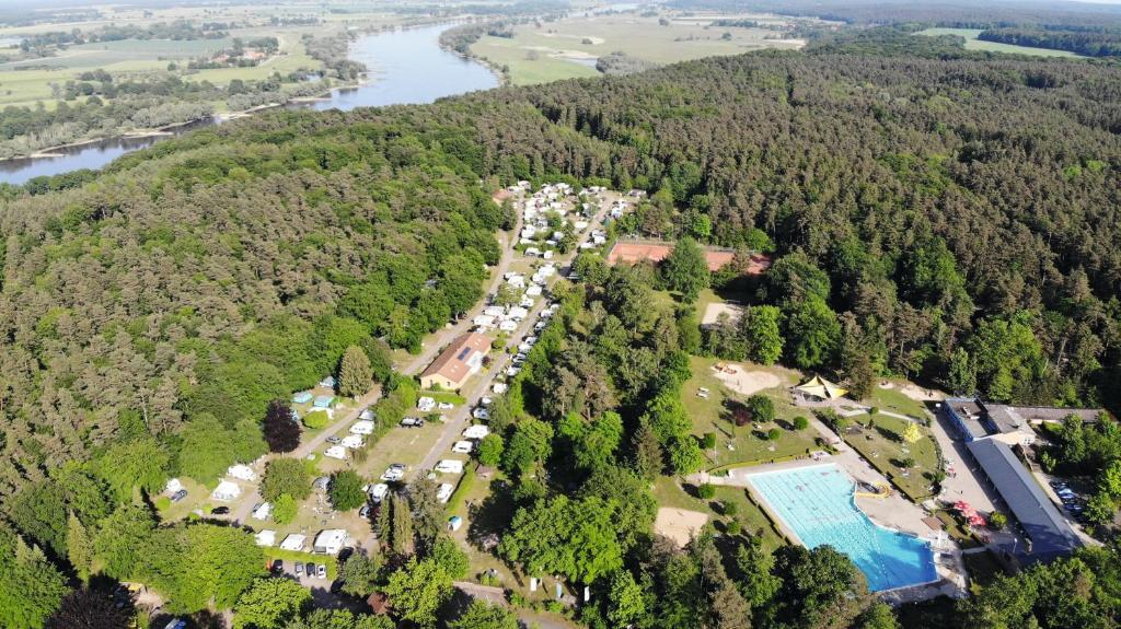an aerial view of a park in the middle of a forest at KNAUS Campingpark Bleckede - Elbtalaue in Bleckede