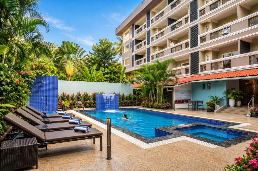 an image of a swimming pool at a hotel at Summit Calangute Resort & Spa in Calangute
