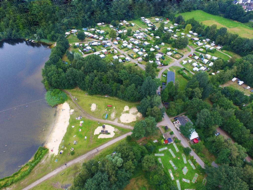 an aerial view of a park next to a lake at KNAUS Campingpark Oyten in Oyten