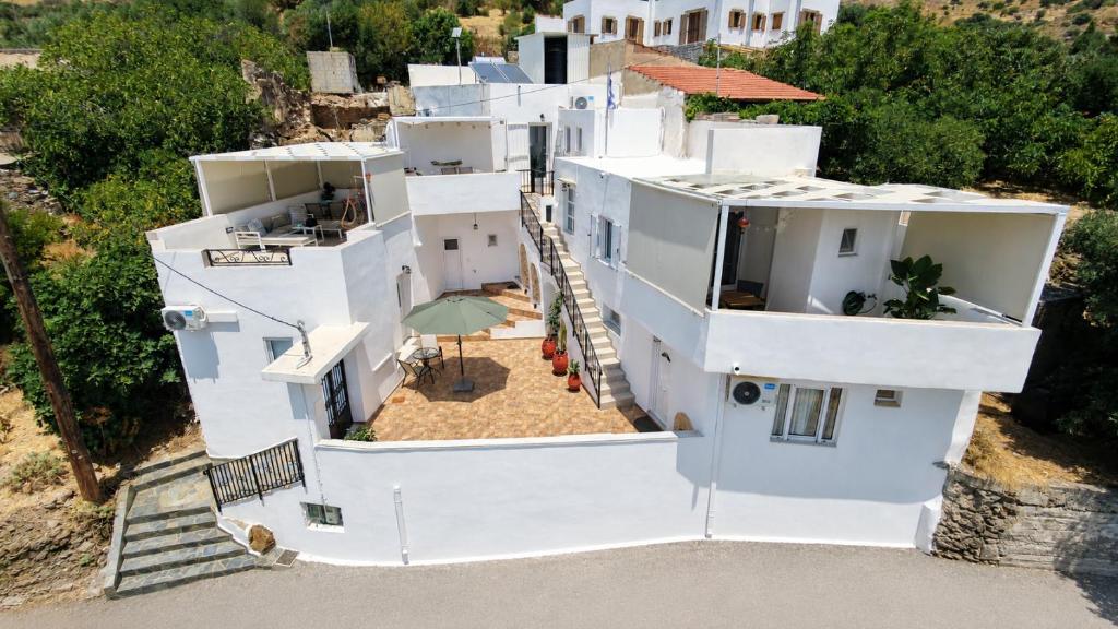 an aerial view of a white house at Aethra Seaview Suites in Kerames