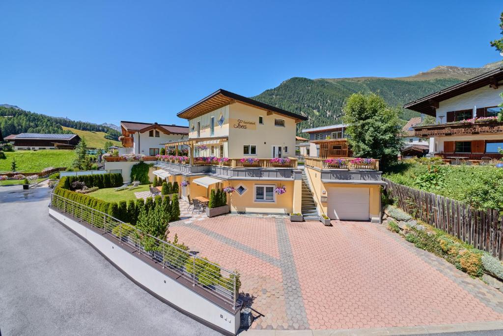 an aerial view of a house with a driveway at Appartement Lea in Niederthai