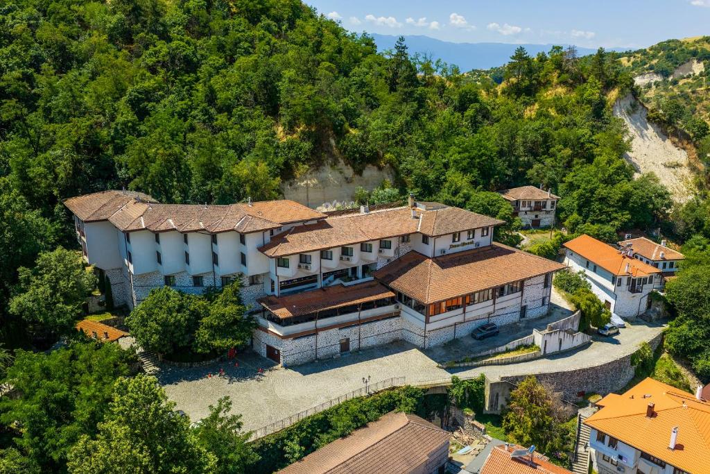 an aerial view of a house in a mountain at Hotel Melnik Хотел Мелник in Melnik