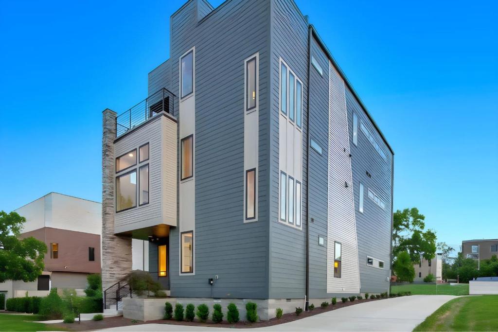 a building with a gray facade at Spacious Gulch Retreat Super Skyline Views in Nashville