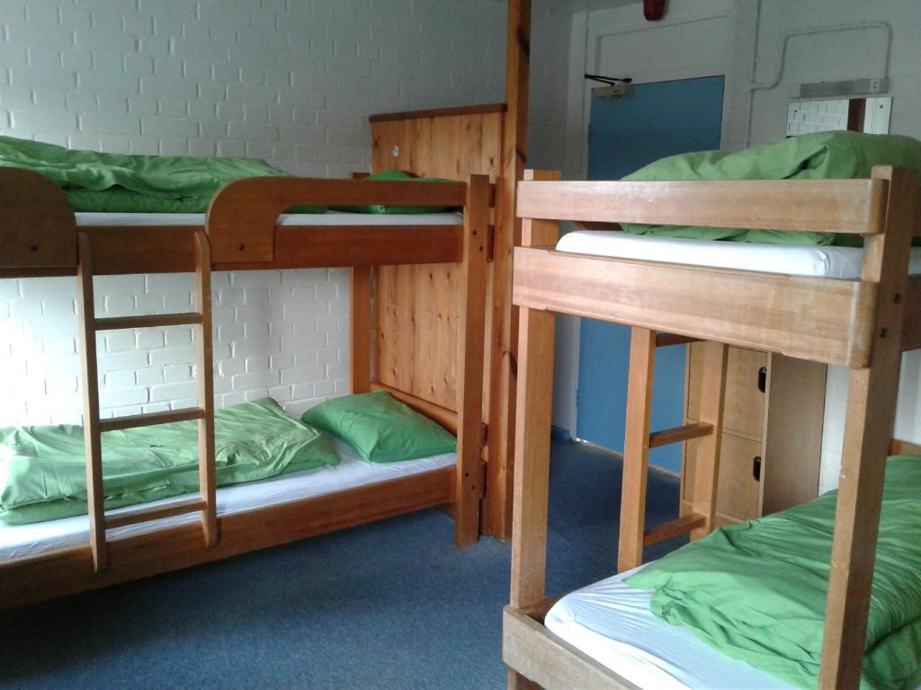 Postel nebo postele na pokoji v ubytování YHA Hawes