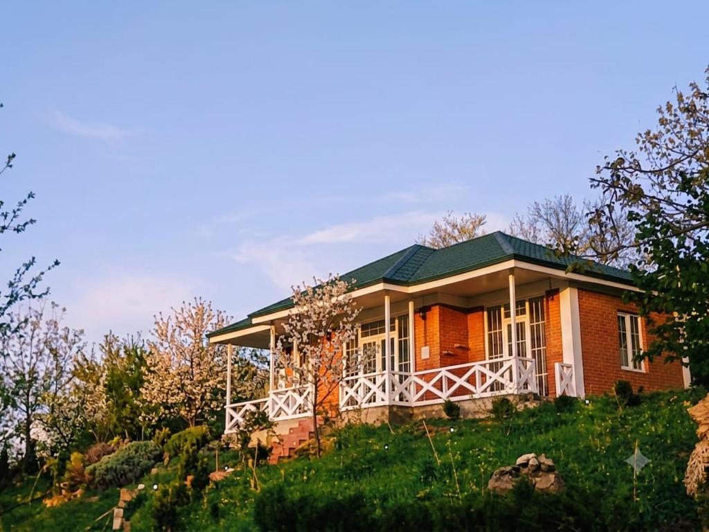 a house on top of a hill at Villa Maiseli in Ambrolauri