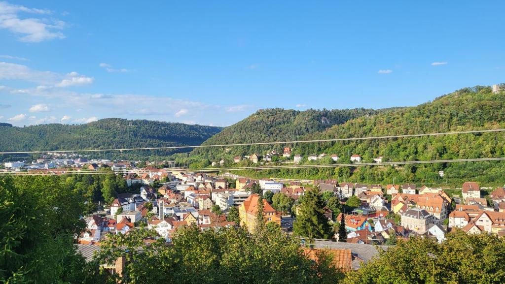 a view of a town in the mountains at FeWo Panoramablick Geislingen in Geislingen an der Steige