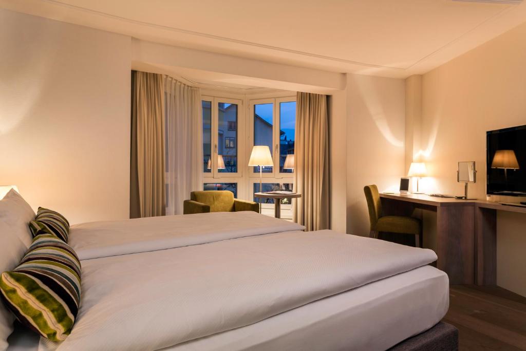 Voodi või voodid majutusasutuse PLATZHIRSCH ZÜRICH - Downtown Boutique Hotel & Sushi Lounge toas