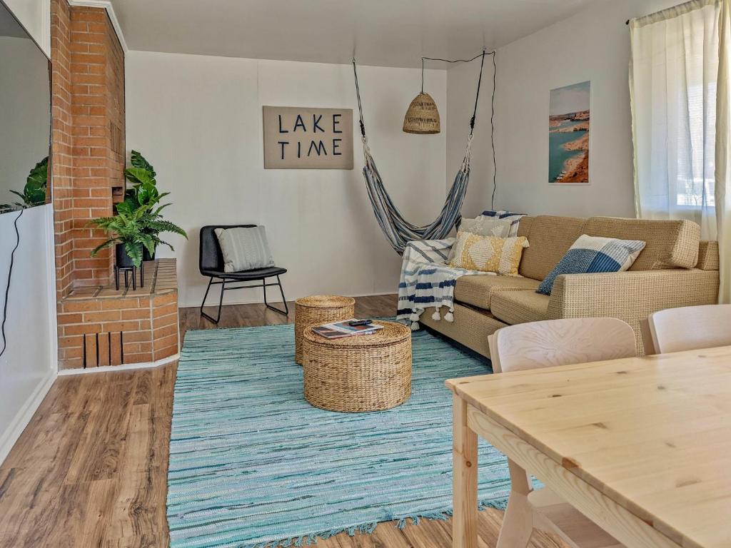 a living room with a couch and a table at Pet-Friendly Near Zion - Hot Tub Downtown Kanab in Kanab
