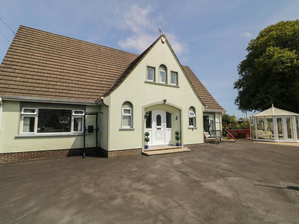 a house with a driveway in front of it at 59 Nursery Avenue in Coleraine