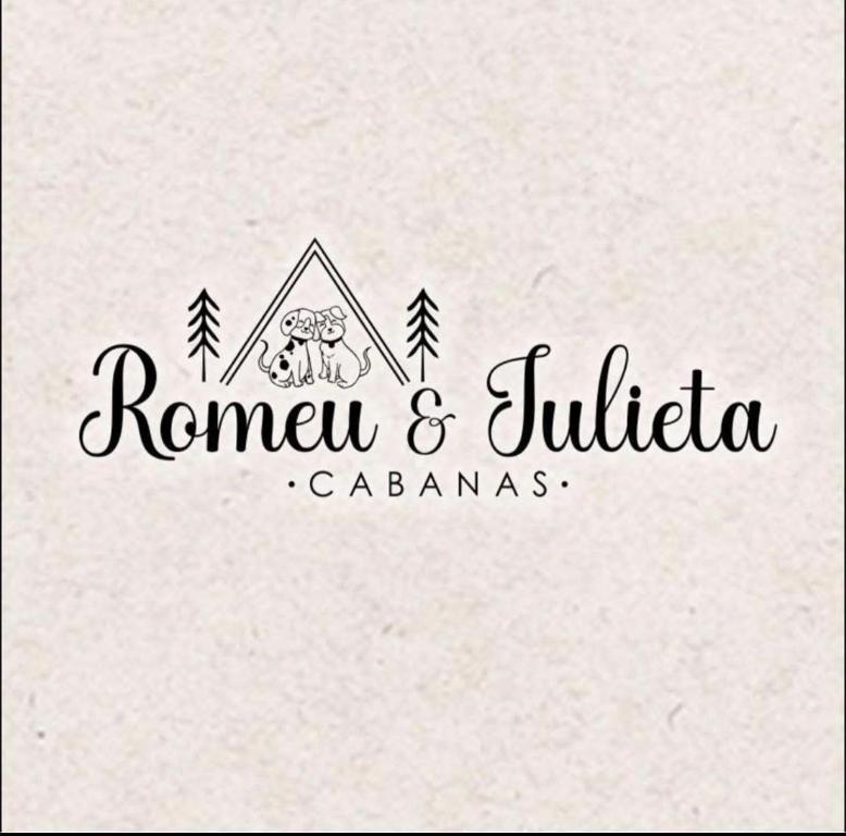 a logo for a camping company with a camel and a tent at Cabanas Romeu & Julieta in Cambará