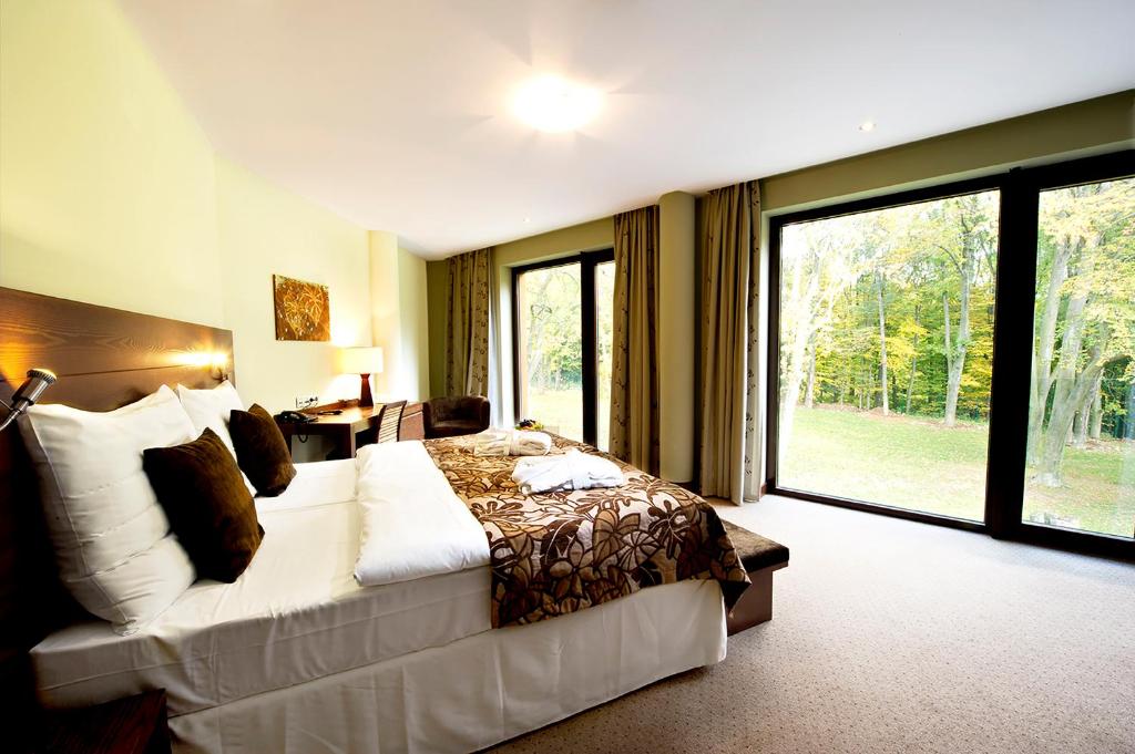 Postel nebo postele na pokoji v ubytování Hotel Zochova Chata - Adult friendly