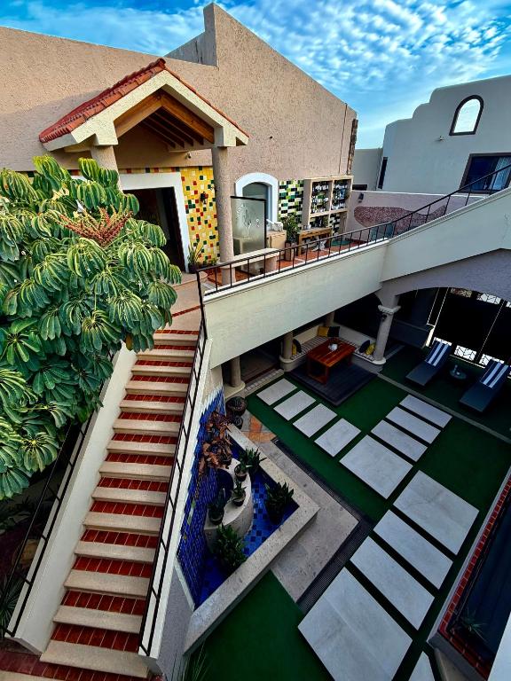 an overhead view of a house with a staircase at Marisol Hotel Boutique in San José del Cabo
