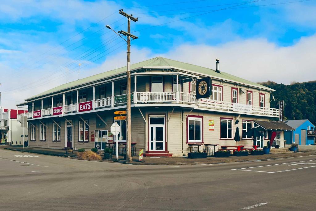 a building on the corner of a street at Hampden Hotel Murchison in Murchison