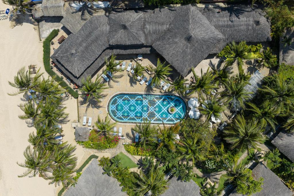 an aerial view of a resort with a swimming pool at Sailing Club Resort Mui Ne in Mui Ne