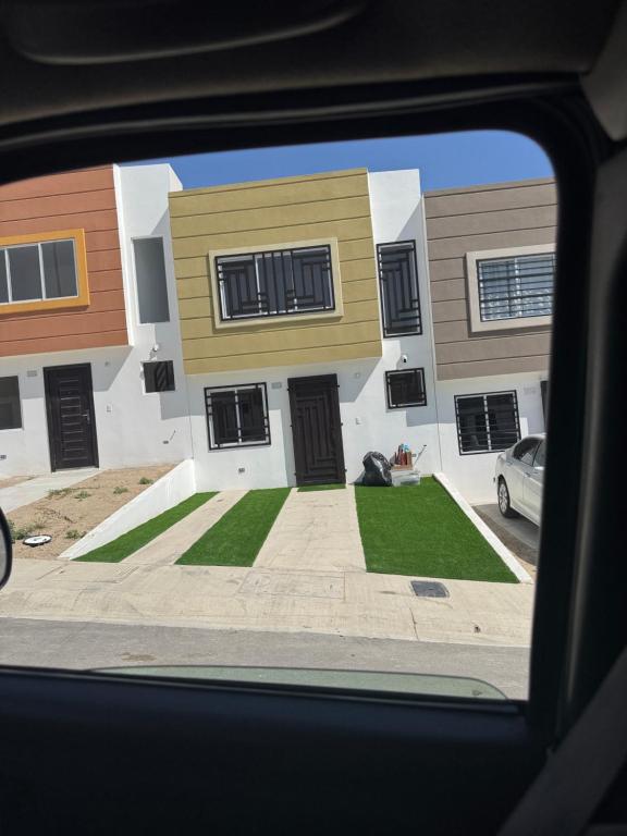 a view of a building from a car window at TadeoHouse in Tijuana