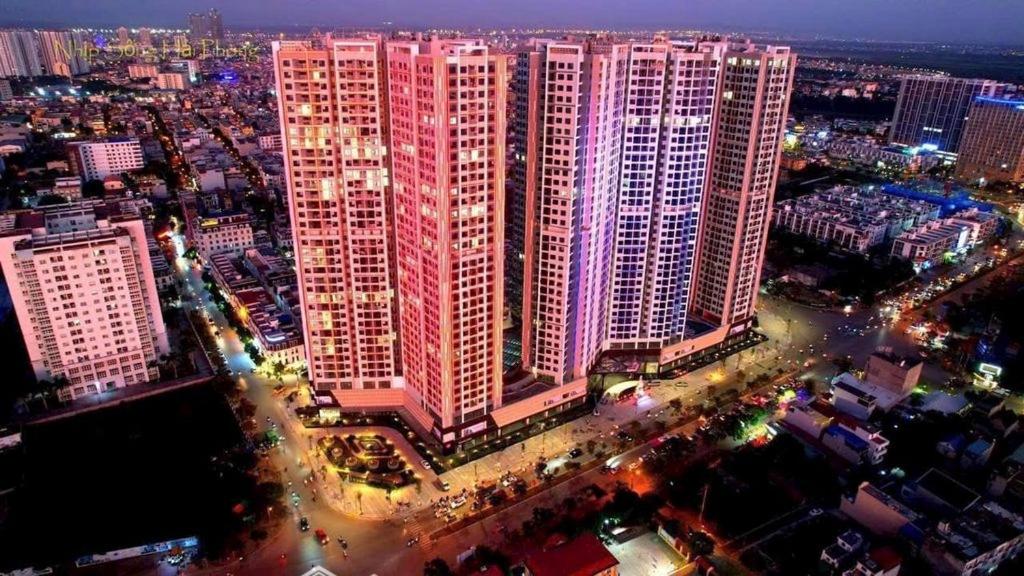 an overhead view of a large city at night at HERE Stay in An Khê