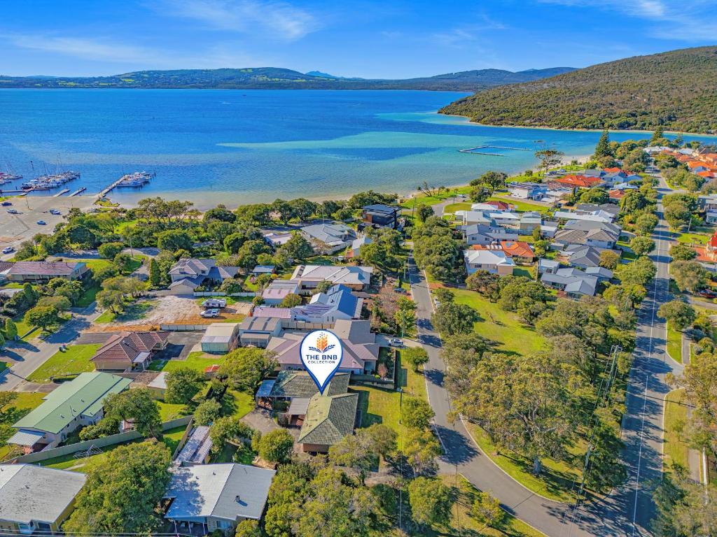 an aerial view of a residential neighborhood next to a body of water at Emu Point Beach Cottages - by the BnB Collection in Emu Point
