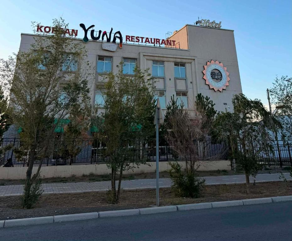 a building with a sign on the side of it at Khatanmandal in Dalandzadgad