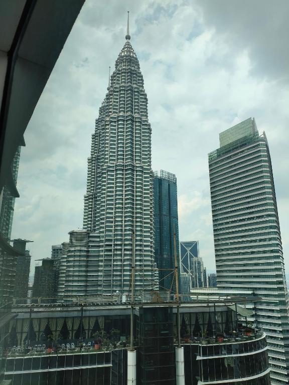 a view of a tall building in a city at Vortex Suites KLCC by Chia in Kuala Lumpur