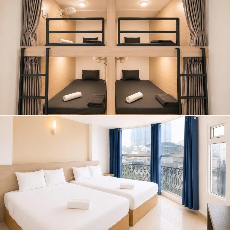 two bunk beds in a room with a window at Sleep & Go Capsule Hostel Bui Vien District 1 in Ho Chi Minh City