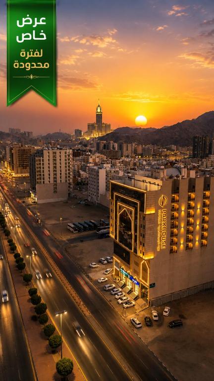 a view of a city at sunset with a freeway at فندق بارك برايم - Park Prime Hotel in Mecca