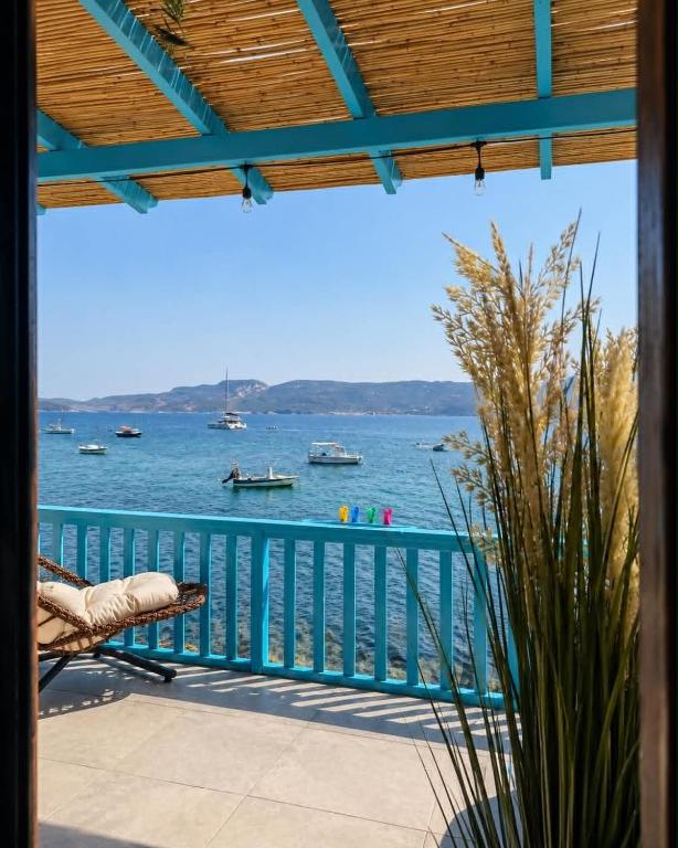 a view of the water from the balcony of a house at Miloa Klima View 'Syrma' in Klima
