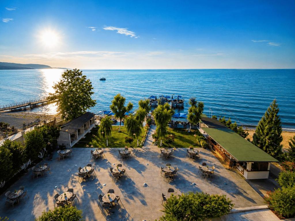 an aerial view of a park next to the ocean at Grand Koru Hotel Beach in Yalova