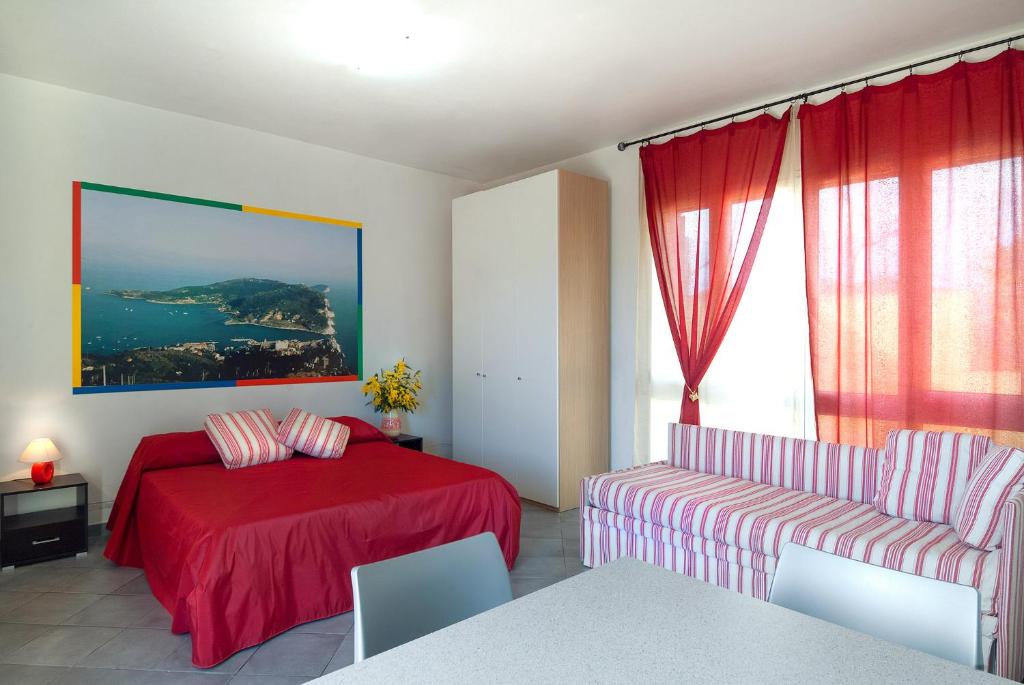 En eller flere senge i et værelse på Gli Ulivi Di Montalbano