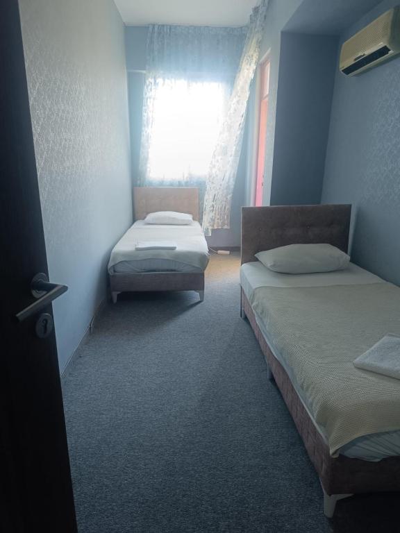تصویر اتاق‌های Sunrise Hotel - تصویر ۲