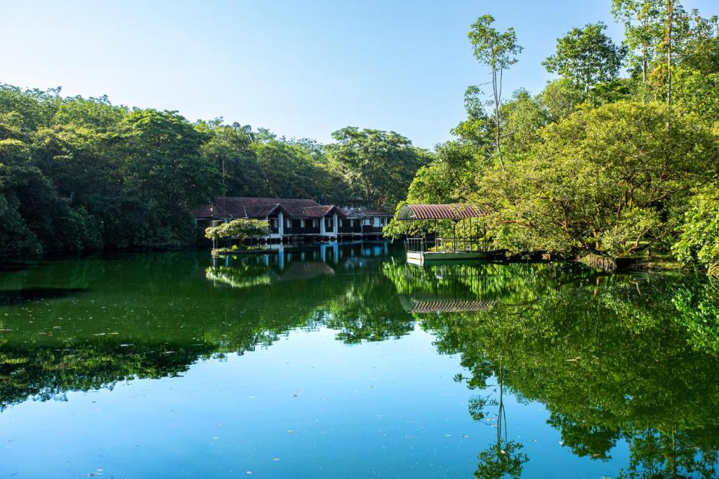 a house in the middle of a river at Serenity Wellness in Kuruwita