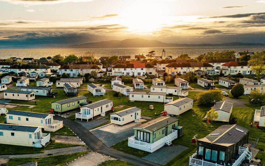 an aerial view of a small town with houses at Solway Holiday Park in Silloth