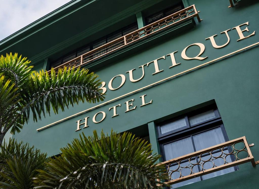a hotel sign on the side of a building at DUO BOUTIQUE HOTEL in Medellín