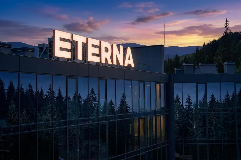 a building with a sign on top of it at ETERNA HOTEL & SPA by Fomich in Palyanytsya