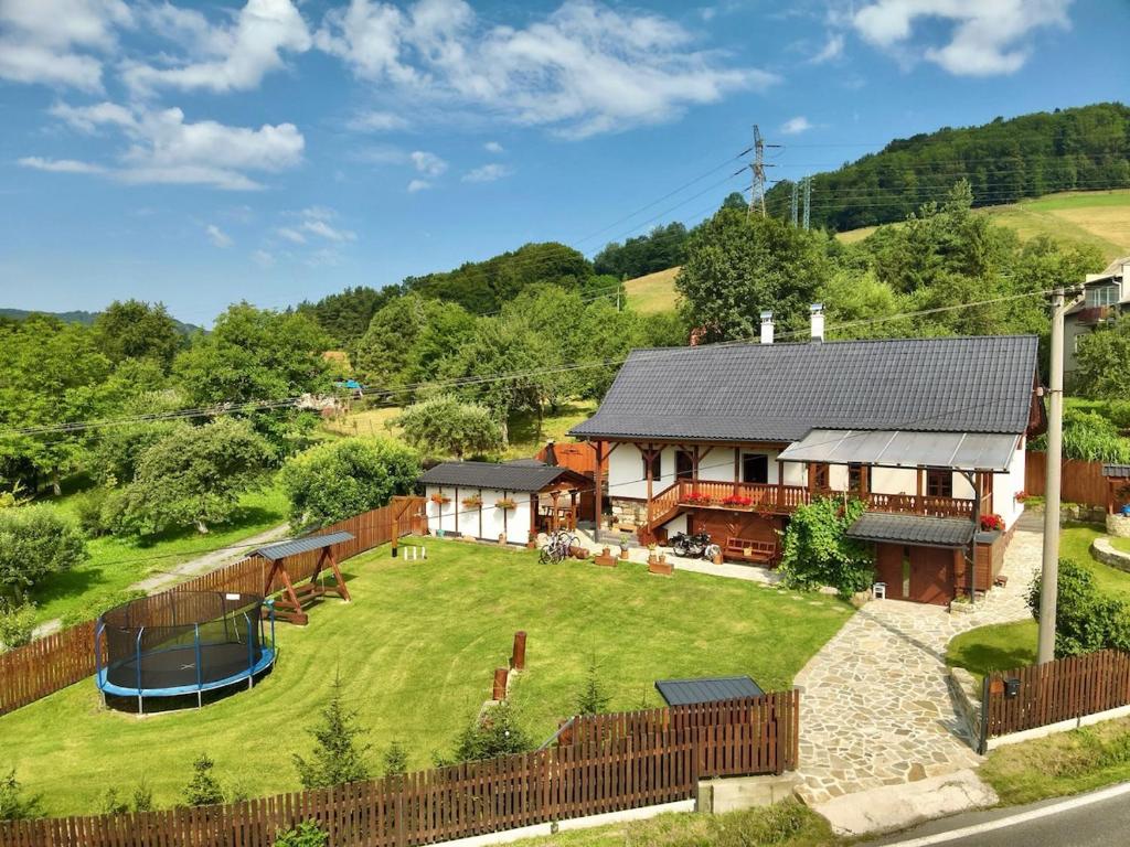 an aerial view of a house with a large yard at Chalupa Na Bačáku in Frýdek-Místek