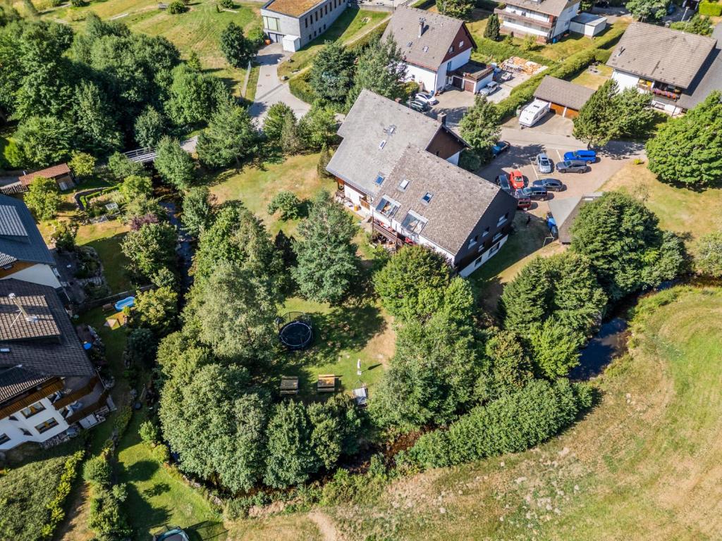 an aerial view of a house with a yard at Großer Garten mit Grill,-Spiel und Sitzmöglichkeiten-umgeben von schöner Natur-Ferienhaus Albmatte in St. Blasien