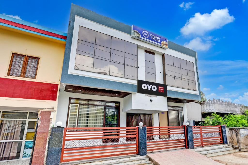 a building with an ovo sign on it at Hotel O DREAM INN in Alwar