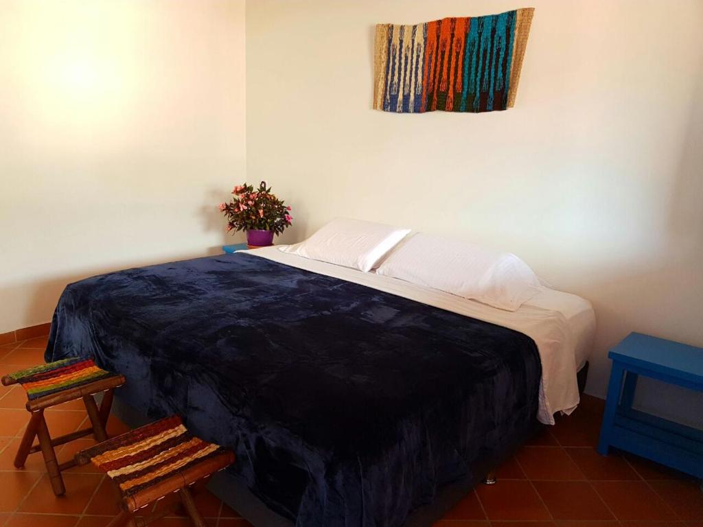 Postel nebo postele na pokoji v ubytování Meraki Boutique Hostel