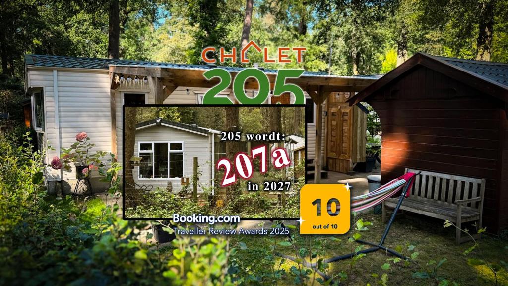 a sale sign in front of a shed at Chalet205, vanaf 2027 Chalet207A in Laag-Soeren