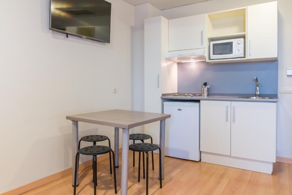 Una cocina o zona de cocina en Vértice Roomspace
