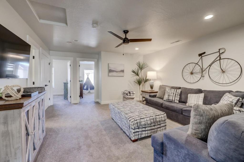 a living room with a bike hanging on the wall at Desert Oasis in Washington