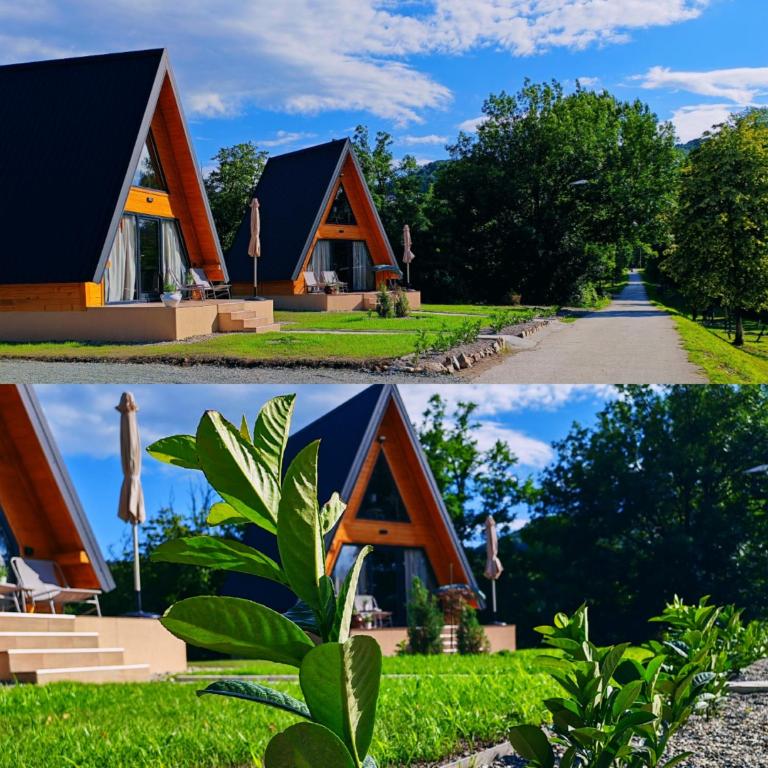 a house with a black roof and a road at Rzav A - Frames in Arilje