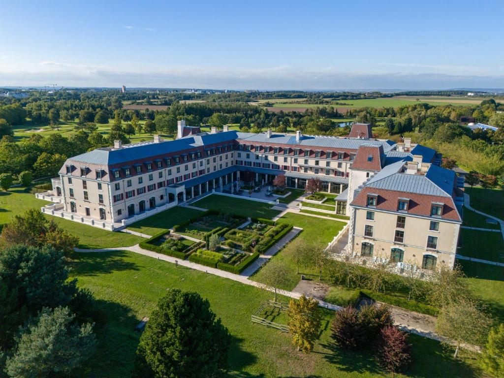an aerial view of a large building at Crowne Plaza Paris Marne-la-Vallée in Magny-le-Hongre