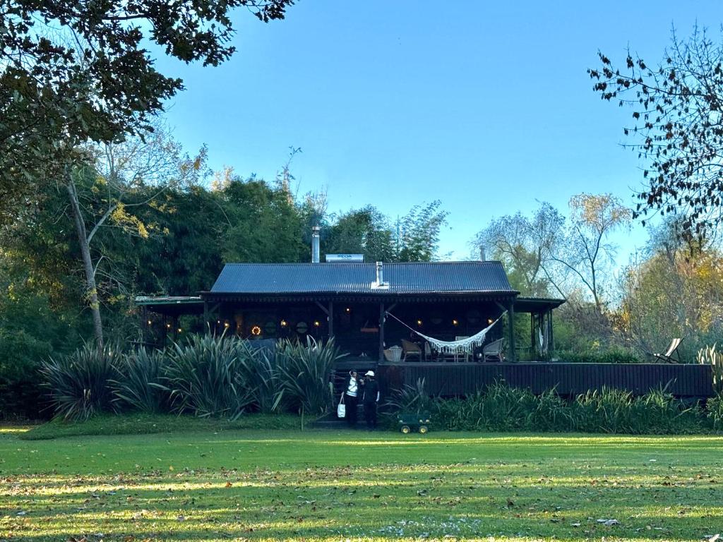 a person standing in front of a building at Isla Chaná Private Hideaway in Buenos Aires