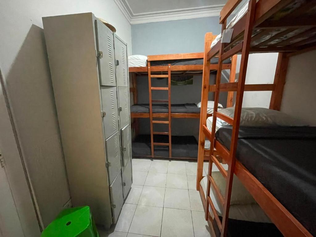 a room with bunk beds and a room with a bunk bed at Recanto Boa Vista in Recife