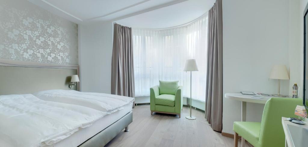 Voodi või voodid majutusasutuse PLATZHIRSCH ZÜRICH - Downtown Boutique Hotel & Sushi Lounge toas