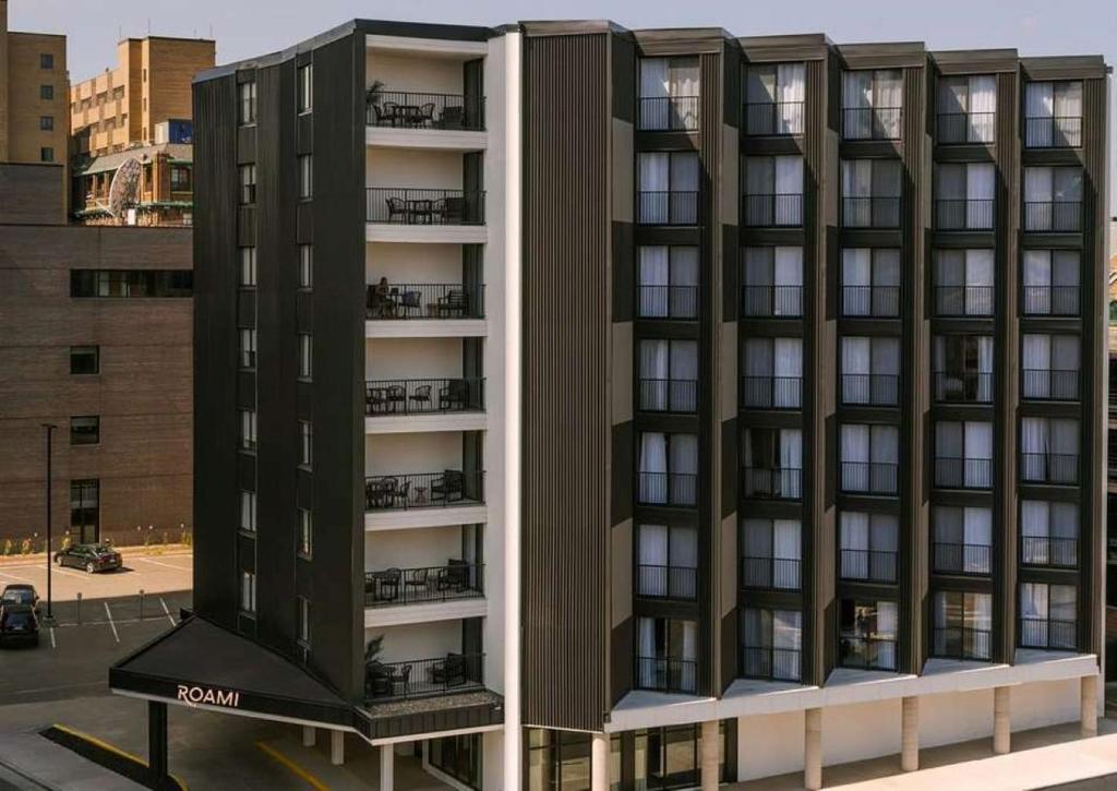 an apartment building with balconies on the side of it at Roami at The Fitz in Saint Paul