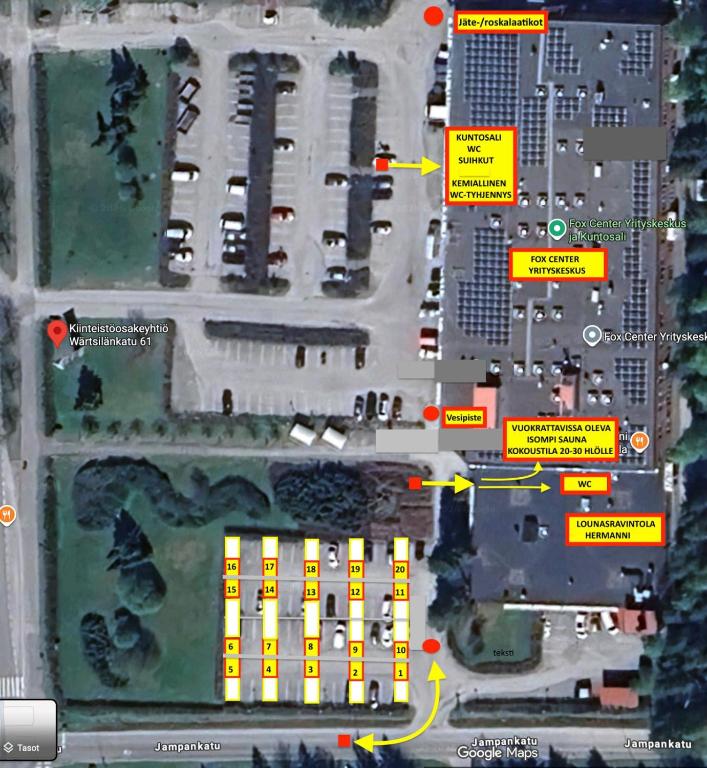 a map of a parking lot with yellow arrows at Fox Center Matkaparkki Järvenpää Only Parking Slot in Järvenpää