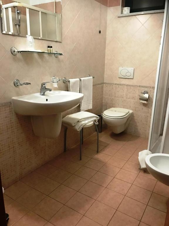 Koupelna v ubytování Hotel Rigolfo