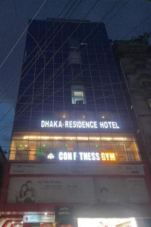 a building with a sign that reads dhaka residence hotel at Dhaka Residence Hotel in Dhaka